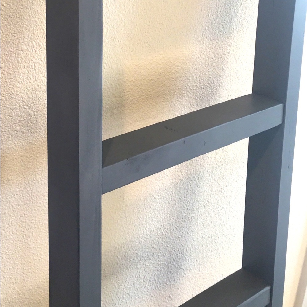 Grey blanket throw ladder